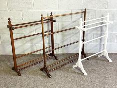 Two modern towel rails, together with two wicker hamper baskets and a rug (5)