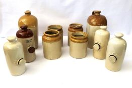 A group of assorted stoneware, including warming bottles etc.