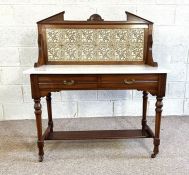 A Victorian stone topped washstand with decorative floral tiled back and turned legs, 122cm high,