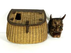 An early 20th century Japanese Hannya Noh mask, the figure representing a Jealous Ogre in a well
