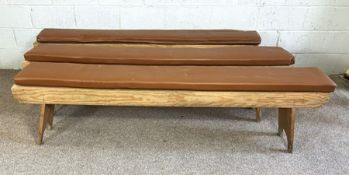 Three vintage stripped pine refectory style benches, 200cm long; with squabs (3)