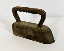 A Carron cast and wrought iron 12 kilogram weighted iron, circa 1900; together with a vintage oil