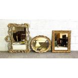 A George II style gilt framed wall mirror, 75cm x 84cm; together with two others smaller (3)