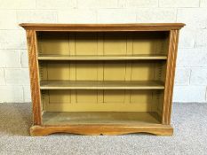 An oak open bookcase, 20th century, with two shelves