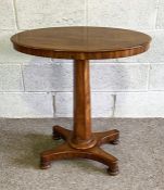 A small Victorian mahogany oval occasional table, circa 1870, with fixed plain oval top on a tapered