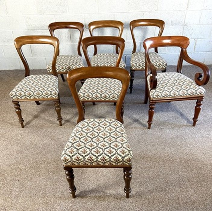 A set of six Victorian mahogany balloon backed dining chairs, and an associated armchair, mid 19th - Image 5 of 15