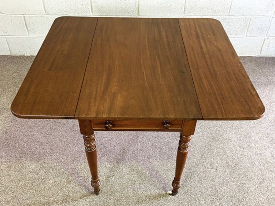 A mahogany Pembroke table, late 19th century, with a rounded drop leaf top, a single end drawer - Image 5 of 6
