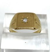 An 18 carat gold and diamond Gentleman’s dress ring, hallmarked, 6.5g