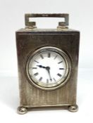 A fine silver Art Deco miniature carriage clock, hallmarked Birmingham 1922, by Adie Brothers,