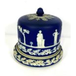 A Victorian blue jasper stoneware stilton/ cheese dish and dome cover, in the manner of Wedgwood but