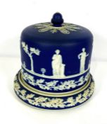 A Victorian blue jasper stoneware stilton/ cheese dish and dome cover, in the manner of Wedgwood but