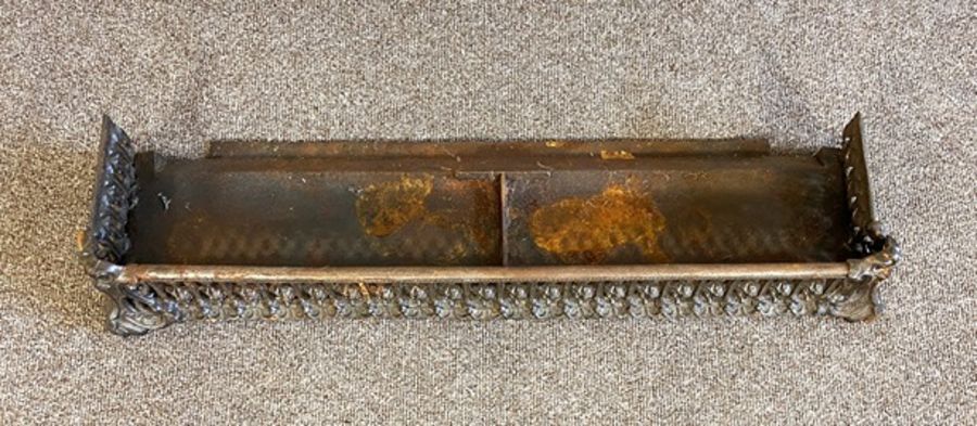 An Arts & Crafts beaten copper fire curb; together with a Victorian cast iron decorative fire - Image 4 of 7