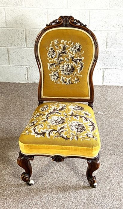 A pretty Victorian walnut framed nursing chair, circa 1870, with later floral tapestry back and - Image 2 of 2