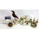 A collection of assorted collectibles, including crested china, assorted Royal commemorative