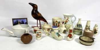 A collection of assorted collectibles, including crested china, assorted Royal commemorative