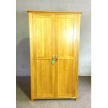 A handy modern two door wardrobe, with panelled doors, and clean modern design