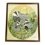 A large assortment of cross stitch and embroidered pictures, including otter, fox, badger and others