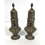 A pair of George III silver casters, hallmarked Sheffield 1790, of typical baluster form, with