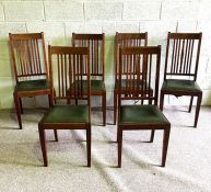 A set of six vintage stick backed dining chairs