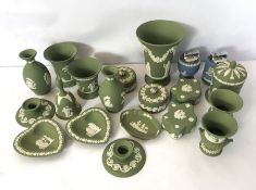 A selection of Wedgwood green jasperware, 20th century, with various vases, pin trays and Campana