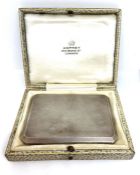 An Asprey silver presentation cigarette case, hallmarked London, 1937, Asprey Ltd, with engine