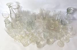A large assortment of glassware, including a whisky glasses, sherry and wine glasses and assorted