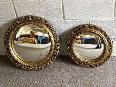 Two modern gilt framed circular Florentine style wall mirrors; together with a large rectangular