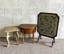 A firescreen, with embroidered panel, decorated with flora, 20th century; together with a small