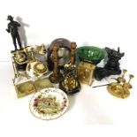 An assortment including three mantel clocks, a vintage style telephone, spelter figures, brassware