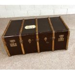 A vintage leather and wood bound travelling trunk, early 20th century, 110cm long; together with