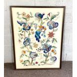 A large decorative embroidery of birds amongst flowers, framed signed Edith Manthorpe, 118cm x 86cm;