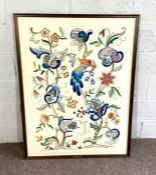 A large decorative embroidery of birds amongst flowers, framed signed Edith Manthorpe, 118cm x 86cm;