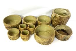 A group of rustic styled ceramic planters (10)