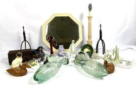 A miscellany of decorative items, including a bird etched paperweight, assorted glass figurines, a