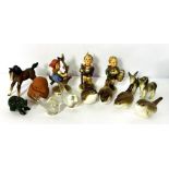 A small group of assorted decorative figures, including four china wrens, three German figures of