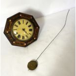 A late 19th century wall clock, with octagonal brass inlaid case, unsigned, 30cm wide; also a