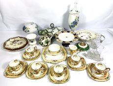 A group of assorted ceramics, including a colourful floral painted tea service, a painted glass