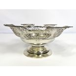 A silver fruit bowl, Sheffield 1928, John Dixon & Sons, of dished form, with fretwork cut