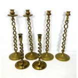 Three pairs of twist stem candlesticks, two pairs very tall 17th century style, one pair with a drip