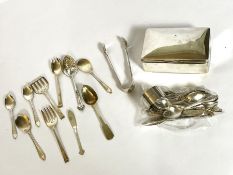 A selection of silver flatware, including a five piece serving set, comprising a butter knife, fork,