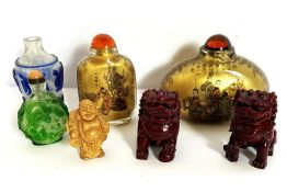 A group of small Chinese and Japanese decorative snuff bottles, together with a pair of resin