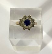 Two rings, including a sapphire and diamond cluster ring, with 9 carat setting; also a diamond