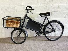 A painted Pashley style vintage Butcher’s bicycle, with wicker basket and support frame, the leather