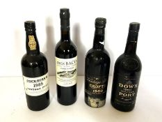 A small quantity of port, including a Cockburn’s Vintage Port, 1985 (1 bottle) ullage into neck;