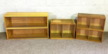 Eleven assorted small glass fronted modern bookcases, some stackable or wall mountable (11)
