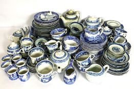 A large assortment of blue and white transfer printed table ware, including a set of Spode, also a