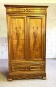 A Continental walnut armoire, late 19th century, probably French circa 1880, with two panelled