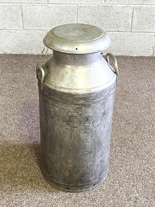 A vintage aluminium Milk churn, marked CWS Ltd, 73cm high