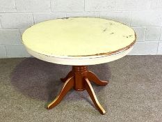 A modern breakfast or centre table, with painted top, 106cm diameter; and a wicker basket (2)