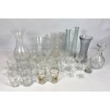 A large assortment of glassware, including a decanter, various vases, assorted tumblers etc. (a